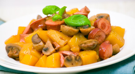 potatoes with mushrooms and sausages