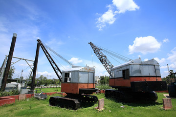 Fototapeta premium Old drag line excavators against blue sky