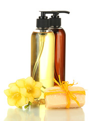 Liquid and hand-made soaps isolated on white