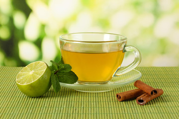 Cup of tea with mint,lime and cinnamon