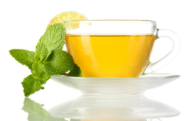 Cup of tea with mint and lime isolated on white