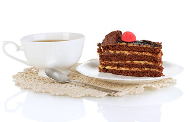 A cup of tea and delicious cake isolated on white
