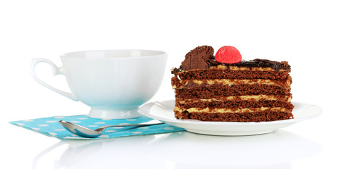 A cup of tea and delicious cake isolated on white