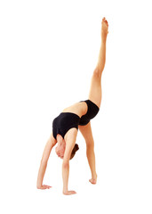 Young woman in black practicing yoga