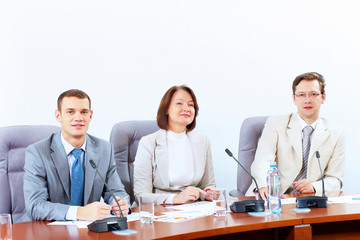 Three businesspeople at meeting