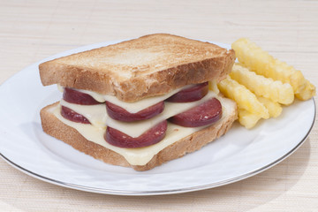 Sandwich with sausage and cheese
