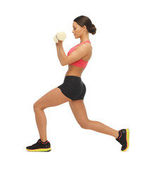 Fototapeta premium woman with dumbbells