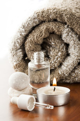Fototapeta na wymiar Aromatherapy oil and candle