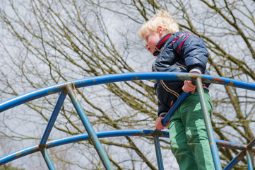Child playing in playgarden