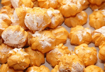 profiteroles choux pastry buns with whipped cream