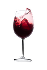 red wine splashing out of a glass, isolated on white