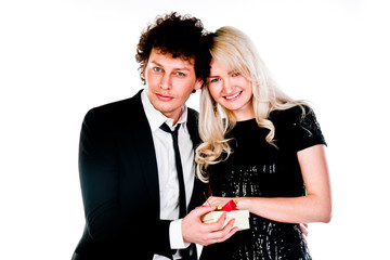 man gives a young and beautiful woman a gift