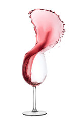 red wine splashing out of a glass, isolated on white