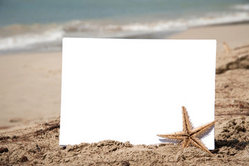 Fototapeta na wymiar White paper on the beach