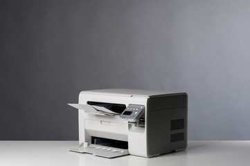 Laser printer isolated on grey background. - 49335927