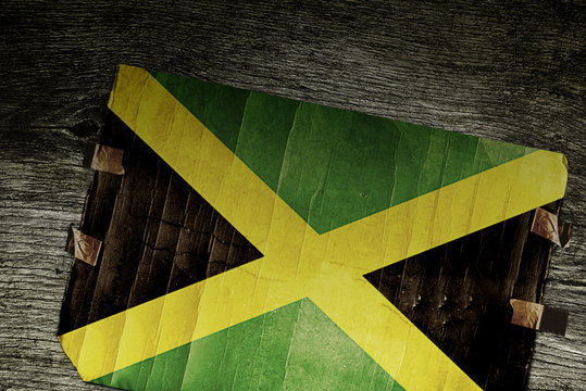 JAMAICAN FLAG ON WOOD