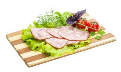 Sausages with salad and basil