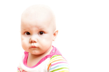 Little sad brown eyed baby, portrait isolated on white