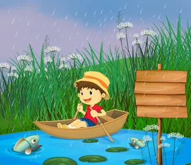 Fotobehang Een rivier en een lachende jongen in een boot © GraphicsRF