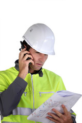 Worker with a two-way radio