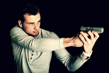 Fototapeta na wymiar człowiek wskazując pistolet