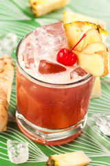 Red drink on a green background