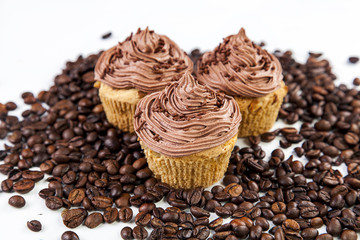 Chocolate cream muffins and cofee beans