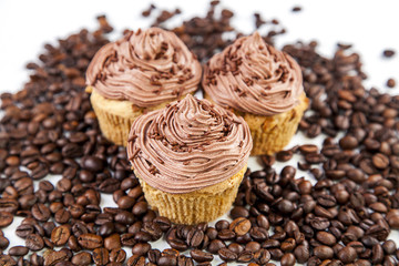 Chocolate cream muffins and cofee beans