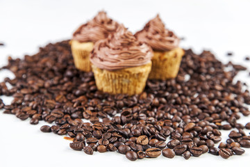 Chocolate cream muffins and cofee beans