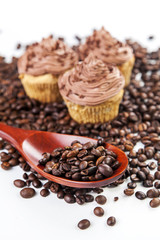 Chocolate cream muffins and cofee beans