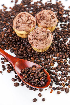 Chocolate cream muffins and cofee beans