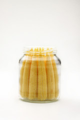 Close up baby corn in bottle.