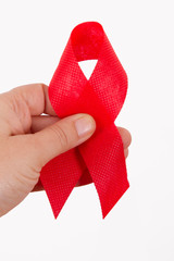 Hand and Red Ribbon Cancer Symbol