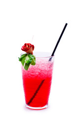 Red cocktail decorated with rose