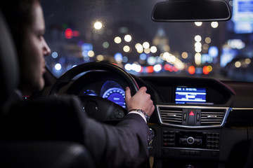 businessman driving car