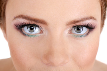 Naklejka premium Beautiful female eyes with bright make-up, close up