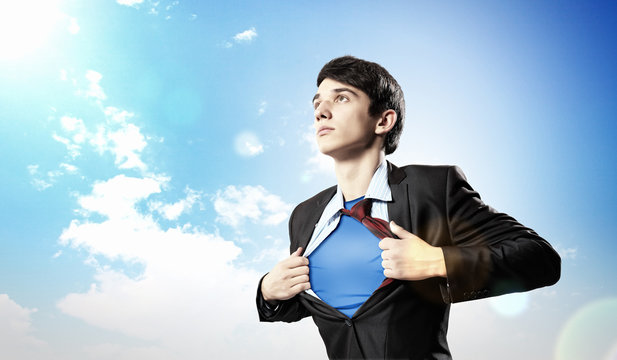 Young superhero businessman