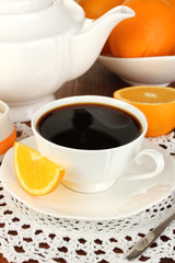 Beautiful white dinner service with oranges