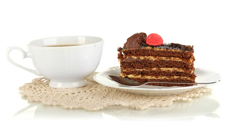 A cup of tea and delicious cake isolated on white
