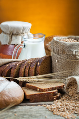 fresh bread and wheat on the wooden