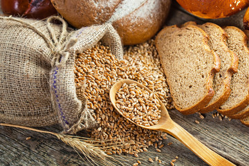 fresh bread and wheat on the wooden