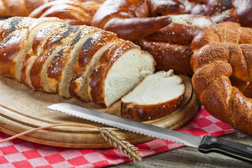 fresh bread and wheat on the wooden