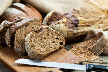 fresh bread and wheat on the wooden