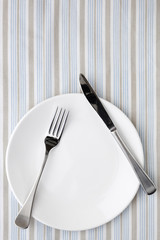 Place Setting on Striped Tablecloth
