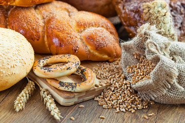 fresh bread and wheat on the wooden