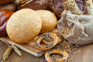 fresh bread and wheat on the wooden