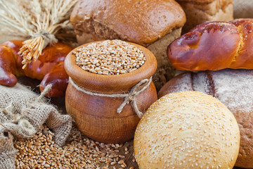 fresh bread and wheat on the wooden