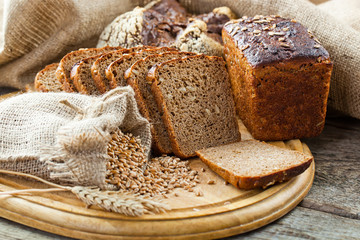 fresh bread and wheat on the wooden