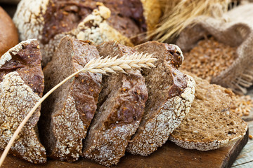 fresh bread and wheat on the wooden