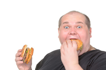 Fat Man Greedily Eating Hamburger